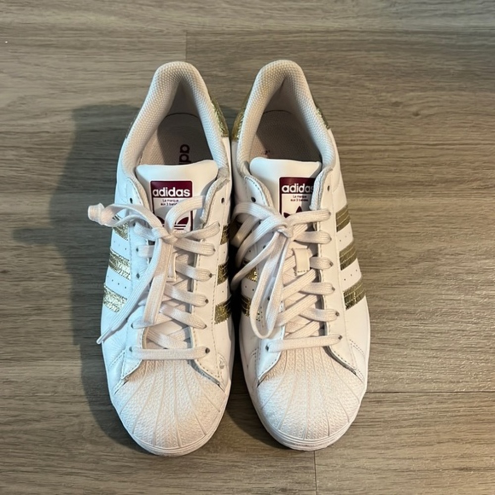 Adidas La marque aux 3 bandes gold